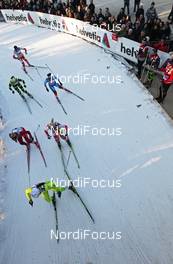 14.01.2012, Milano, Italy (ITA): group, in front Katja Visnar (SLO), Fischer, Rottefella, One Way, Swix, behind Chandra Crawford (CAN), Fischer, Rottefella, Swix, One Way  - FIS world cup cross-country, individual sprint, Milano (ITA). www.nordicfocus.com. © Hemmersbach/NordicFocus. Every downloaded picture is fee-liable.
