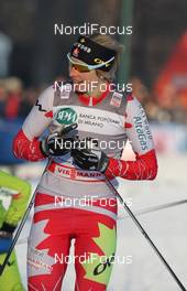 14.01.2012, Milano, Italy (ITA): Chandra Crawford (CAN), Fischer, Rottefella, Swix, One Way  - FIS world cup cross-country, individual sprint, Milano (ITA). www.nordicfocus.com. © Hemmersbach/NordicFocus. Every downloaded picture is fee-liable.