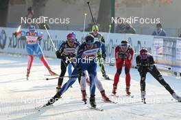 15.01.2012, Milano, Italy (ITA): group, in front Anne Kylloenen (FIN), Fischer, Swix, Craft, Rottefella, behind Bettina Gruber (SUI), Rossignol, Rottefella, One Way, Odlo, Toko, TCS  - FIS world cup cross-country, team sprint, Milano (ITA). www.nordicfocus.com. © Hemmersbach/NordicFocus. Every downloaded picture is fee-liable.