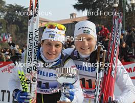 15.01.2012, Milano, Italy (ITA): todays winner, l-r: Ida Ingemarsdotter (SWE), Rossignol, Rottefella, Craft and Hanna Brodin (SWE), Madshus, Craft, Rottefella, Casco  - FIS world cup cross-country, team sprint, Milano (ITA). www.nordicfocus.com. © Hemmersbach/NordicFocus. Every downloaded picture is fee-liable.