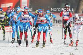 15.01.2012, Milano, Italy (ITA): exchange, l-r: Nikolay Morilov (RUS), Madshus, Rottefella, adidas, Swix and Alexei Petukhov (RUS), Fischer, Fischer, Rottefella, Swix, Adidas  - FIS world cup cross-country, team sprint, Milano (ITA). www.nordicfocus.com. © Hemmersbach/NordicFocus. Every downloaded picture is fee-liable.