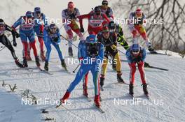 04.02.2012, Rybinsk, Russia (RUS): group, in front Roland Clara (ITA), Fischer, Rottefella, Swix, behind right Alexander Legkov (RUS), Rossignol, Rottefella, Swix, adidas and Jens Filbrich (GER), Rossignol, Rottefella, One Way, adidas  - FIS world cup cross-country, mass men, Rybinsk (RUS). www.nordicfocus.com. © Hemmersbach/NordicFocus. Every downloaded picture is fee-liable.