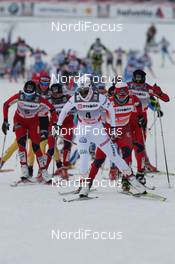 04.02.2012, Rybinsk, Russia (RUS): the leading group, in front Charlotte Kalla (SWE), Fischer, Salomon, Swix, Craft, behind, l-r: Marthe Kristoffersen (NOR), Atomic, Salomon, Swix, Marit Bjoergen (NOR), Fischer, Rottefella, Swix - FIS world cup cross-country, mass women, Rybinsk (RUS). www.nordicfocus.com. © Hemmersbach/NordicFocus. Every downloaded picture is fee-liable.