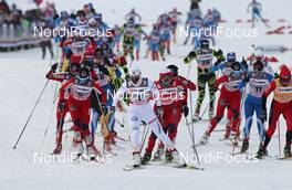 04.02.2012, Rybinsk, Russia (RUS): the leading group, in front Charlotte Kalla (SWE), Fischer, Salomon, Swix, Craft, behind, l-r: Marthe Kristoffersen (NOR), Atomic, Salomon, Swix, Marit Bjoergen (NOR), Fischer, Rottefella, Swix, Justyna Kowalczyk (POL), Fischer, Rottefella, Swix  - FIS world cup cross-country, mass women, Rybinsk (RUS). www.nordicfocus.com. © Hemmersbach/NordicFocus. Every downloaded picture is fee-liable.