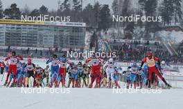 04.02.2012, Rybinsk, Russia (RUS): after the start with the stadium in the background - FIS world cup cross-country, mass women, Rybinsk (RUS). www.nordicfocus.com. © Hemmersbach/NordicFocus. Every downloaded picture is fee-liable.