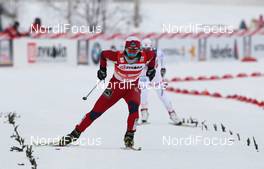 04.02.2012, Rybinsk, Russia (RUS): on the final lane: Marit Bjoergen (NOR), Fischer, Rottefella, Swix, behind Charlotte Kalla (SWE), Fischer, Salomon, Swix, Craft - FIS world cup cross-country, mass women, Rybinsk (RUS). www.nordicfocus.com. © Hemmersbach/NordicFocus. Every downloaded picture is fee-liable.