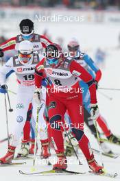 04.02.2012, Rybinsk, Russia (RUS): in front Vibeke W. Skofterud (NOR), Fischer, Rottefella, Alpina, One Way, Swix, behind Maria Rydqvist (SWE), Fischer, Rottefella, Alpina, One Way   - FIS world cup cross-country, mass women, Rybinsk (RUS). www.nordicfocus.com. © Hemmersbach/NordicFocus. Every downloaded picture is fee-liable.
