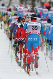 05.02.2012, Rybinsk, Russia (RUS): the race field in the uphill, in the focus Pavel Siulatov (RUS), Fischer, Rottefella, Alpina, One Way, Adidas - FIS world cup cross-country, skiathlon men, Rybinsk (RUS). www.nordicfocus.com. © Hemmersbach/NordicFocus. Every downloaded picture is fee-liable.
