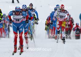05.02.2012, Rybinsk, Russia (RUS): l-r: Dimitri Japarov (RUS), Fischer, Rottefella, Alpina, Swix, Adidas, Ivan Babikov (CAN), Salomon, One Way  - FIS world cup cross-country, skiathlon men, Rybinsk (RUS). www.nordicfocus.com. © Hemmersbach/NordicFocus. Every downloaded picture is fee-liable.