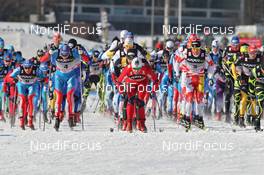 11.02.2012, Nove Mesto, Czech Republic (CZE): start, l-r: Maxim Vylegzhanin (RUS), Fischer, Rottefella, Alpina, Swix, adidas, Alexander Legkov (RUS), Rossignol, Rottefella, Swix, adidas, Petter Northug (NOR), Fischer, Rottefella, Alpina, Ski Go, Swix, Devon Kershaw (CAN), Fischer, Salomon, Swix, One Way, Tobias Angerer (GER), Rossignol, Rottefella, One Way, adidas  - FIS world cup cross-country, mass men, Nove Mesto (CZE). www.nordicfocus.com. © Hemmersbach/NordicFocus. Every downloaded picture is fee-liable.