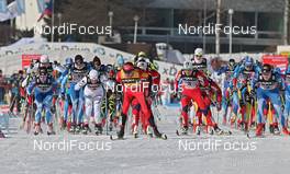 11.02.2012, Nove Mesto, Czech Republic (CZE): start, in front in the center Justyna Kowalczyk (POL), Fischer, Rottefella, Swix  - FIS world cup cross-country, mass women, Nove Mesto (CZE). www.nordicfocus.com. © Hemmersbach/NordicFocus. Every downloaded picture is fee-liable.