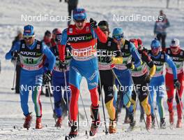 12.02.2012, Nove Mesto, Czech Republic (CZE): in front Stanislav Volzhentsev (RUS), Madshus, Rottefella, Swix, Adidas  - FIS world cup cross-country, 4x10km men, Nove Mesto (CZE). www.nordicfocus.com. © Hemmersbach/NordicFocus. Every downloaded picture is fee-liable.