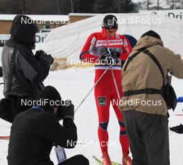 10.02.2012, Nove Mesto, Czech Republic (CZE): photographers focused on Petter Northug (NOR), Fischer, Rottefella, Alpina, Ski Go, Swix   - FIS world cup cross-country, training, Nove Mesto (CZE). www.nordicfocus.com. © Hemmersbach/NordicFocus. Every downloaded picture is fee-liable.