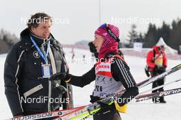 10.02.2012, Nove Mesto, Czech Republic (CZE): Thomas Klinger (GER), Bayerischer Rundfunk talking with Stefanie Boehler (GER), Rossignol, Rottefella, Alpina, One Way, adidas  - FIS world cup cross-country, training, Nove Mesto (CZE). www.nordicfocus.com. © Hemmersbach/NordicFocus. Every downloaded picture is fee-liable.