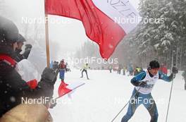 19.02.2012, Szklarska Poreba, Poland (POL): the spectators cheer for the particpants - FIS world uphill trophy, Szklarska Poreba (POL). www.nordicfocus.com. © Hemmersbach/NordicFocus. Every downloaded picture is fee-liable.
