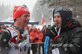 19.02.2012, Szklarska Poreba, Poland (POL): Juerg Capol (SUI), FIS race director cross-country gives Andrew Newell (USA), Fischer, Salomon, Swix interview to Kjell-Erik Kristiansen (NOR), Speaker  - FIS world uphill trophy, Szklarska Poreba (POL). www.nordicfocus.com. © Hemmersbach/NordicFocus. Every downloaded picture is fee-liable.