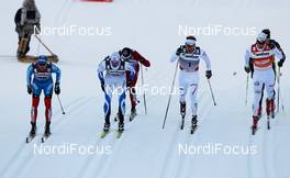 04.03.2012, Lahti, Finland (FIN): (l-r) Nikita Kriukov (RUS), Rossignol, Swix, Rottefella, Adidas, Siim Sellis (EST), Fischer, Swix, Salomon, Emil Joensson (SWE), Fischer, Swix, Salomon, Craft and Teodor Peterson (SWE), Rossignol, One Way, Alpina, Rottefella, Craft  - FIS world cup cross-country, individual sprint, Lahti (FIN). www.nordicfocus.com. Â© Laiho/NordicFocus. Every downloaded picture is fee-liable.
