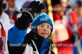 04.03.2012, Lahti, Finland (FIN): prices were handed over by a local snow kid  - FIS world cup cross-country, individual sprint, Lahti (FIN). www.nordicfocus.com. Â© Laiho/NordicFocus. Every downloaded picture is fee-liable.