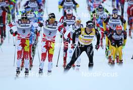 03.03.2012, Lahti, Finland (FIN):  (l-r) Alex Harvey (CAN), Fischer, Swix, Salomon, One Way, Devon Kershaw (CAN), Fischer, Swix, Salomon, One Way and Dario Cologna (SUI), Fischer, Swix, Alpina, Rottefella, Odlo - FIS world cup cross-country, skiathlon men, Lahti (FIN). www.nordicfocus.com. Â© Laiho/NordicFocus. Every downloaded picture is fee-liable.