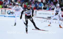 03.03.2012, Lahti, Finland (FIN): Jonas Baumann (SUI), Atomic, Leki, Odlo  - FIS world cup cross-country, skiathlon men, Lahti (FIN). www.nordicfocus.com. Â© Laiho/NordicFocus. Every downloaded picture is fee-liable.