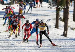 03.03.2012, Lahti, Finland (FIN):  Dario Cologna (SUI), Fischer, Swix, Alpina, Rottefella, Odlo followed by Alexander Legkov (RUS), Rossignol, Swix, Rottefella, Adidas and Martin Johnsrud Sundby (NOR), Fischer, KV+, Rottefella, Swix - FIS world cup cross-country, skiathlon men, Lahti (FIN). www.nordicfocus.com. Â© Laiho/NordicFocus. Every downloaded picture is fee-liable.