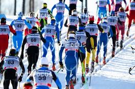 03.03.2012, Lahti, Finland (FIN):  lots of skiers in an uphill - FIS world cup cross-country, skiathlon men, Lahti (FIN). www.nordicfocus.com. Â© Laiho/NordicFocus. Every downloaded picture is fee-liable.