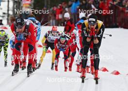 10.03.2012, Oslo, Norway (NOR): l-r: Eldar Roenning (NOR), Rossignol, Rottefella, Swix and Dario Cologna (SUI), Fischer, Rottefella, Alpina, Swix, Odlo  - FIS world cup cross-country, mass men, Oslo (NOR). www.nordicfocus.com. © Hemmersbach/NordicFocus. Every downloaded picture is fee-liable.