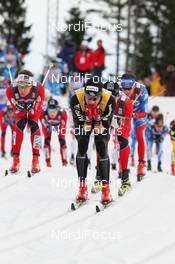 10.03.2012, Oslo, Norway (NOR): in front Dario Cologna (SUI), Fischer, Rottefella, Alpina, Swix, Odlo  - FIS world cup cross-country, mass men, Oslo (NOR). www.nordicfocus.com. © Hemmersbach/NordicFocus. Every downloaded picture is fee-liable.