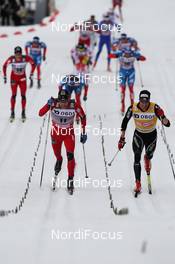 10.03.2012, Oslo, Norway (NOR): final sprint, l-r: Eldar Roenning (NOR), Rossignol, Rottefella, Swix and Dario Cologna (SUI), Fischer, Rottefella, Alpina, Swix, Odlo  - FIS world cup cross-country, mass men, Oslo (NOR). www.nordicfocus.com. © Hemmersbach/NordicFocus. Every downloaded picture is fee-liable.