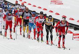 10.03.2012, Oslo, Norway (NOR): in front Kristian Tettli Rennemo (NOR), Fischer, Rottefella, Alpina, One Way, Swix, behind Dario Cologna (SUI), Fischer, Rottefella, Alpina, Swix, Odlo, behind Martin Johnsrud Sundby (NOR), Fischer, Rottefella, Swix, KV+  - FIS world cup cross-country, mass men, Oslo (NOR). www.nordicfocus.com. © Hemmersbach/NordicFocus. Every downloaded picture is fee-liable.
