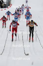 10.03.2012, Oslo, Norway (NOR): final sprint, l-r: Eldar Roenning (NOR), Rossignol, Rottefella, Swix, Dario Cologna (SUI), Fischer, Rottefella, Alpina, Swix, Odlo  - FIS world cup cross-country, mass men, Oslo (NOR). www.nordicfocus.com. © Hemmersbach/NordicFocus. Every downloaded picture is fee-liable.