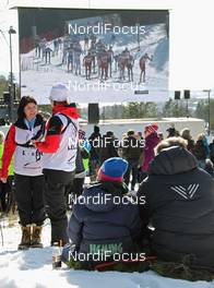 10.03.2012, Oslo, Norway (NOR): spectators and video wall - FIS world cup cross-country, mass men, Oslo (NOR). www.nordicfocus.com. © Hemmersbach/NordicFocus. Every downloaded picture is fee-liable.