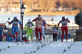 14.03.2012, Stockholm, Sweden (SWE): finish, l-r: Julia Ivanova (RUS), Fischer, Salomon, adidas, Marit Bjoergen (NOR), Fischer, Rottefella, Swix, Maiken Caspersen Falla (NOR), Fischer, Rottefella, Alpina, Swix  - FIS world cup cross-country, individual sprint, Stockholm (SWE). www.nordicfocus.com. © Hemmersbach/NordicFocus. Every downloaded picture is fee-liable.