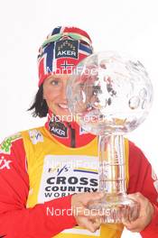 18.03.2012, Falun, Sweden (SWE): Overall World Cup Winner 2011/2012 and Distance World Cup Winner 2011/2012 Marit Bjoergen (NOR), Fischer, Rottefella, Swix  - FIS world cup cross-country, cups, Falun (SWE). www.nordicfocus.com. © Hemmersbach/NordicFocus. Every downloaded picture is fee-liable.