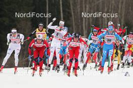 17.03.2012, Falun, Sweden (SWE): l-r: Teodor Peterson (SWE), Rossignol, Alpina, One Way, Craft, Eirik Brandsdal (NOR), Fischer, Rottefella, Alpina, Swix, behind Dario Cologna (SUI), Fischer, Rottefella, Alpina, Swix, Odlo, Marcus Hellner (SWE), Fischer, Salomon, Exel, Craft, Paal Golberg (NOR), Madshus, Rottefella, Alpina, Swix, Frederico Pellegrino (ITA), Rossignol, Alpina, Rottefella, One Way - FIS world cup cross-country, mass women, Falun (SWE). www.nordicfocus.com. © Hemmersbach/NordicFocus. Every downloaded picture is fee-liable.