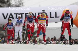 17.03.2012, Falun, Sweden (SWE): l-r: Heidi Weng (NOR), Madshus, Swix, Alpina, Rottefella, Charlotte Kalla (SWE), Fischer, Salomon, Swix, Craft, Therese Johaug (NOR), Fischer, Salomon, Swix, Marit Bjoergen (NOR), Fischer, Rottefella, Swix, Justyna Kowalczyk (POL), Fischer, Rottefella, Swix  - FIS world cup cross-country, mass women, Falun (SWE). www.nordicfocus.com. © Hemmersbach/NordicFocus. Every downloaded picture is fee-liable.