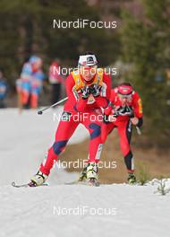 18.03.2012, Falun, Sweden (SWE): in front Marit Bjoergen (NOR), Fischer, Rottefella, Swix, behind Justyna Kowalczyk (POL), Fischer, Rottefella, Swix  - FIS world cup cross-country, 10km women handicap start, Falun (SWE). www.nordicfocus.com. © Hemmersbach/NordicFocus. Every downloaded picture is fee-liable.
