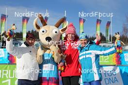 17.01.2012, Innsbruck, Austria (AUT): podium with mascot, l-r: 2nd Kentaro Ishikawa (JAP), 1st Alexander Selyaninov (RUS), 3rd Sergey Malyshev (KAZ) - 1st Winter Youth Olympic Games 2012, Innsbruck (AUT). www.nordicfocus.com. © Hemmersbach/NordicFocus. Every downloaded picture is fee-liable.