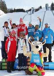 17.01.2012, Innsbruck, Austria (AUT): todays winner with their coaches and the mascot Yoggl - 1st Winter Youth Olympic Games 2012, Innsbruck (AUT). www.nordicfocus.com. © Hemmersbach/NordicFocus. Every downloaded picture is fee-liable.