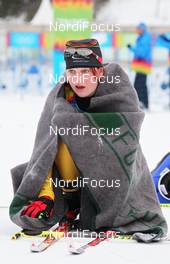 17.01.2012, Innsbruck, Austria (AUT): Victoria Carl (GER), tired in the finish area - 1st Winter Youth Olympic Games 2012, Innsbruck (AUT). www.nordicfocus.com. © Hemmersbach/NordicFocus. Every downloaded picture is fee-liable.