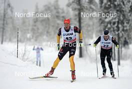 24.11.2012, Gaellivare, Sweden (SWE): l-r: Hannes Dotzler (GER), Michail Semenov (BLR) - FIS world cup cross-country, 15km men, Gaellivare (SWE). www.nordicfocus.com. © Felgenhauer/NordicFocus. Every downloaded picture is fee-liable.
