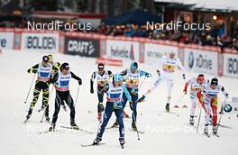 25.11.2012, Gaellivare, Sweden (SWE): lots of traffic at the handover zone - FIS world cup cross-country, 4x7,5km men, Gaellivare (SWE). www.nordicfocus.com. © Felgenhauer/NordicFocus. Every downloaded picture is fee-liable.