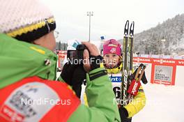 01.12.2012, Kuusamo, Finland (FIN): Tanja Winterhalder (GER) takes a video of  Kikkan Randall (USA) - FIS world cup cross-country, 5km women, Kuusamo (FIN). www.nordicfocus.com. © Felgenhauer/NordicFocus. Every downloaded picture is fee-liable.