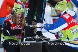 30.11.2012, Kuusamo, Finland (FIN):  volunteers setting the timing transponders - FIS world cup cross-country, individual sprint, Kuusamo (FIN). www.nordicfocus.com. © Laiho/NordicFocus. Every downloaded picture is fee-liable.