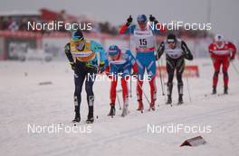 02.12.2012, Kuusamo, Finland (FIN): (l-r) Alexey Poltoranin (KAZ), Fischer, Swix, Rottefella, Alexander Legkov (RUS), Rossignol, Swix, Rottefella, Adidas, Maxim Vylegzhanin (RUS), Fischer, Swix, Alpina, Rottefella, Adidas and Dario Cologna (SUI), Fischer, Swix, Alpina, Rottefella, Odlo  - FIS world cup cross-country, pursuit men, Kuusamo (FIN). www.nordicfocus.com. © Laiho/NordicFocus. Every downloaded picture is fee-liable.