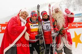 02.12.2012, Kuusamo, Finland (FIN): (l-r) Mrs. Santa Claus, Marit Bjoergen (NOR), Fischer, Swix, Rottefella, Heidi Weng (NOR), Madshus, Swix, Alpina, Rottefella and the Santa Claus  - FIS world cup cross-country, pursuit women, Kuusamo (FIN). www.nordicfocus.com. © Laiho/NordicFocus. Every downloaded picture is fee-liable.