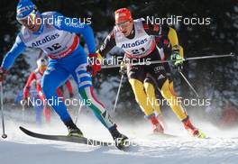 13.12.2012, Canmore, Canada (CAN):  Hannes Dotzler (GER), Fischer, Swix, Alpina, Rottefella, Adidas - FIS world cup cross-country, mass men, Canmore (CAN). www.nordicfocus.com. © Roycroft/NordicFocus. Every downloaded picture is fee-liable.