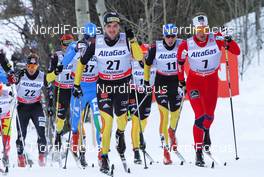 13.12.2012, Canmore, Canada (CAN):  (l-r) Thomas Bing (GER), Rossignol, Swix, Rottefella, Adidas and Chris Andre Jespersen (NOR), Rossignol, Start, Rottefella, Skigo - FIS world cup cross-country, mass men, Canmore (CAN). www.nordicfocus.com. © Roycroft/NordicFocus. Every downloaded picture is fee-liable.