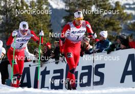 13.12.2012, Canmore, Canada (CAN):  Chris Andre Jespersen (NOR), Rossignol, Start, Rottefella, Skigo followed by Sjur Roethe (NOR), Fischer, KV+, Salomon, Swix - FIS world cup cross-country, mass men, Canmore (CAN). www.nordicfocus.com. © Roycroft/NordicFocus. Every downloaded picture is fee-liable.
