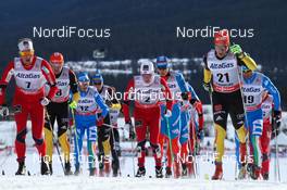 13.12.2012, Canmore, Canada (CAN):  (l-r) Chris Andre Jespersen (NOR), Rossignol, Start, Rottefella, Skigo, Sjur Roethe (NOR), Fischer, KV+, Salomon, Swix and Hannes Dotzler (GER), Fischer, Swix, Alpina, Rottefella, Adidas - FIS world cup cross-country, mass men, Canmore (CAN). www.nordicfocus.com. © Roycroft/NordicFocus. Every downloaded picture is fee-liable.